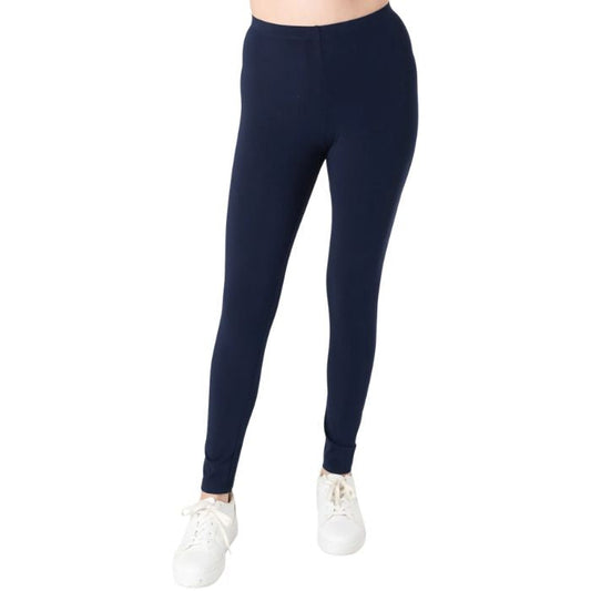 female model wearing ink blue suri full length leggings front view on white background 