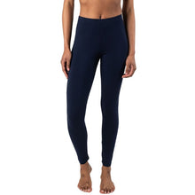 bottom of female model wearing ink blue suri full length leggings back view on white background 