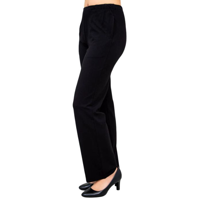 female model wearing black susan pants side view on white background