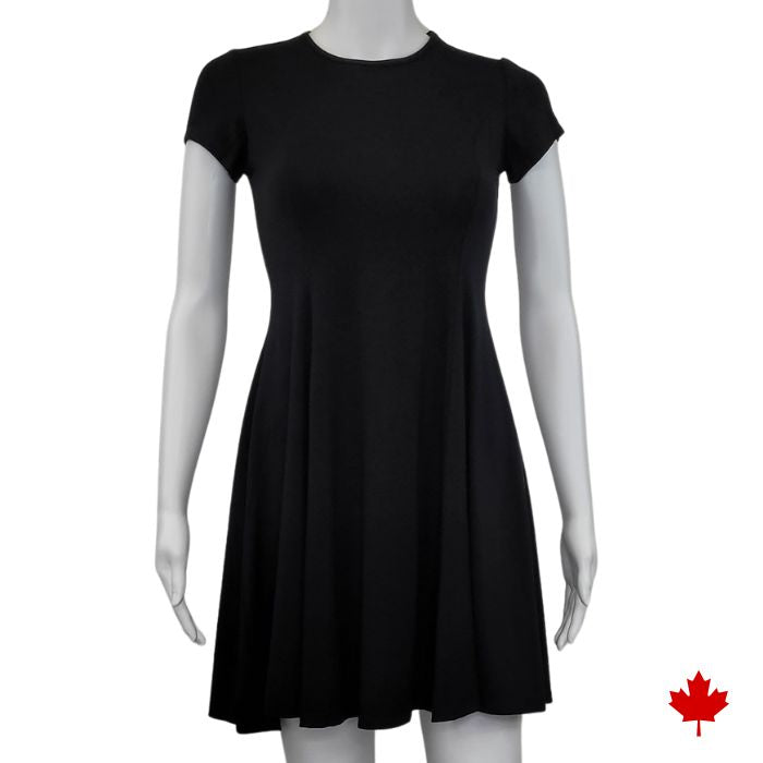 mannequin wearing black swing dress front view on white background