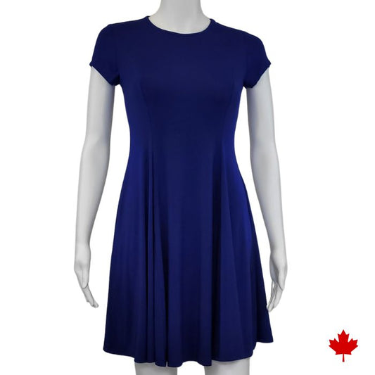 mannequin wearing indigo blue swing dress front view on white background