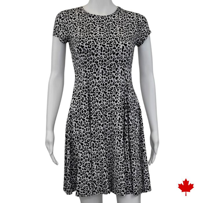mannequin wearing leopard print swing dress front view on white background