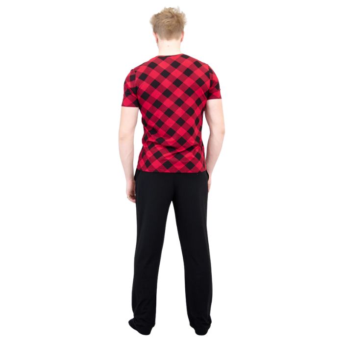 male model wearing black tanner pants and adam top back view on white background