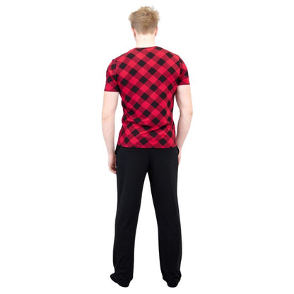 male model wearing black tanner pants and adam top back view on white background