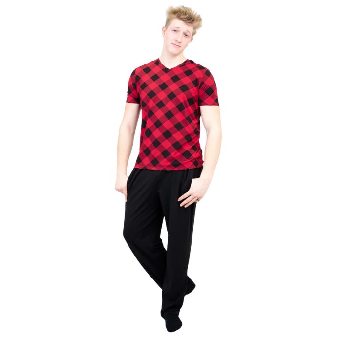 male model wearing black tanner pants and adam top front view on white background