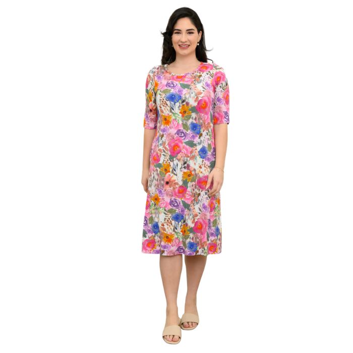 female model wearing pink bouquet print tee dress front view on white background