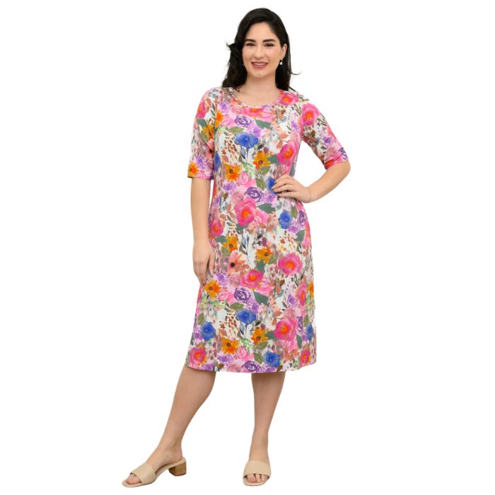 female model wearing pink bouquet print tee dress front view on white background