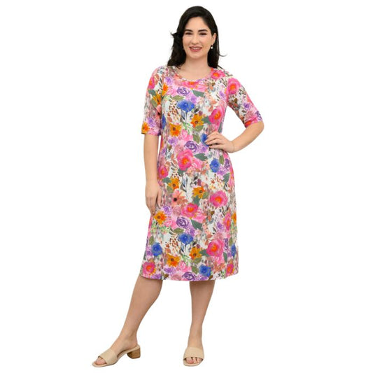 female model wearing pink bouquet print tee dress front view on white background