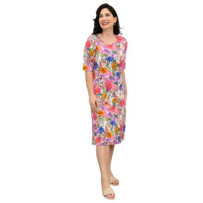 female model wearing pink bouquet print tee dress front view on white background