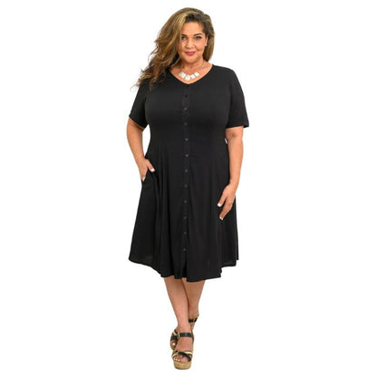 female model wearing black teresa dress front view on white background