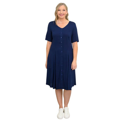 female model wearing indigo blue teresa dress front view on white background