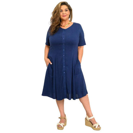 female model wearing indigo blue teresa dress front view on white background