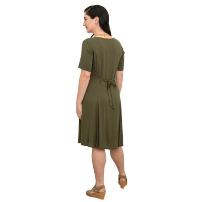 female model wearing khaki green teresa dress back view on white background