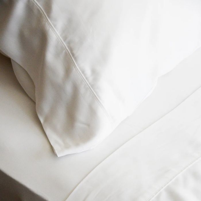 white terrera bamboo pillowcase on a pillow on a made bed