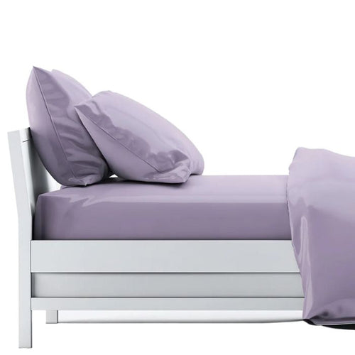 bed made with amethyst purple sheet set, flat sheet, fitted sheet and two pillowcases on white background