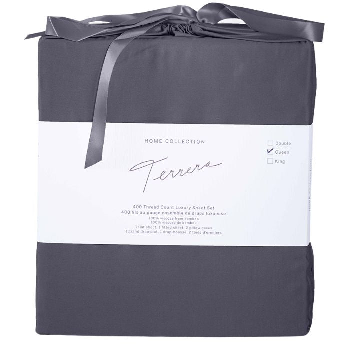 charcoal grey bamboo fabric bag containg sheet set- flat sheet, fitted sheet and two pillowcases on white background