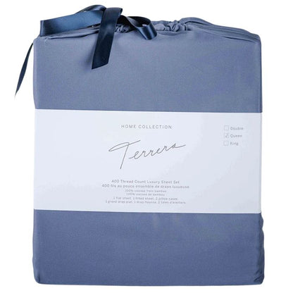 mineral blue bamboo fabric bag containg sheet set- flat sheet, fitted sheet and two pillowcases on white background