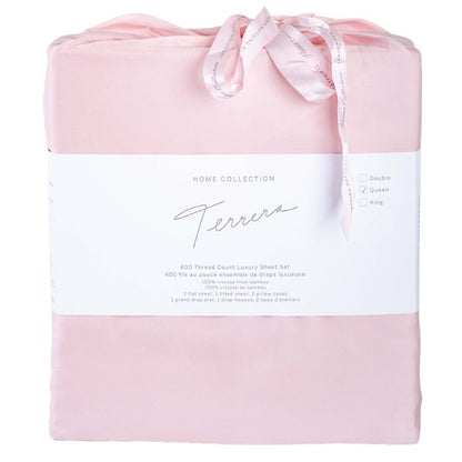 pale rose pink bamboo fabric bag containg sheet set- flat sheet, fitted sheet and two pillowcases on white background