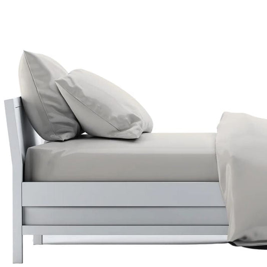 bed made with taupe brown sheet set, flat sheet, fitted sheet and two pillowcases on white background