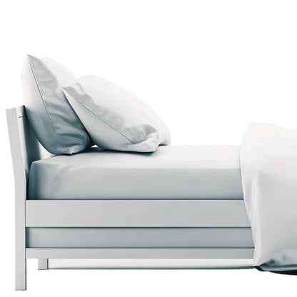 bed made with white sheet set, flat sheet, fitted sheet and two pillowcases on white background