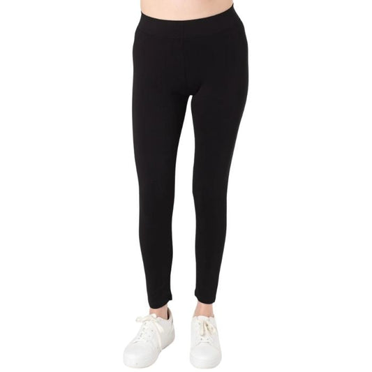 female model wearing black terry leggings front view on white background