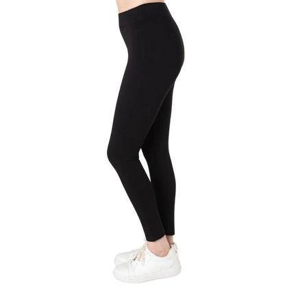 female model wearing black terry leggings side view on white background