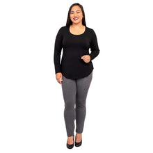female model wearing tessa long sleeve top black and nadia granite grey pants front view on white background