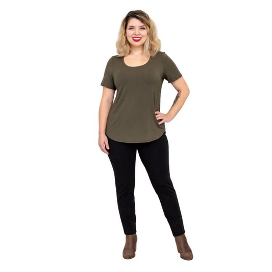 female model wearing khaki green tessa tee and black nadia pants front view on white background