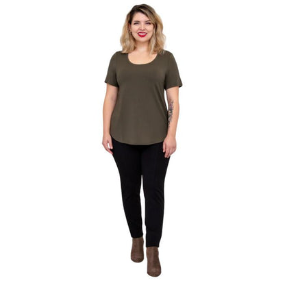 female model wearing khaki green tessa tee and black nadia pants front view on white background