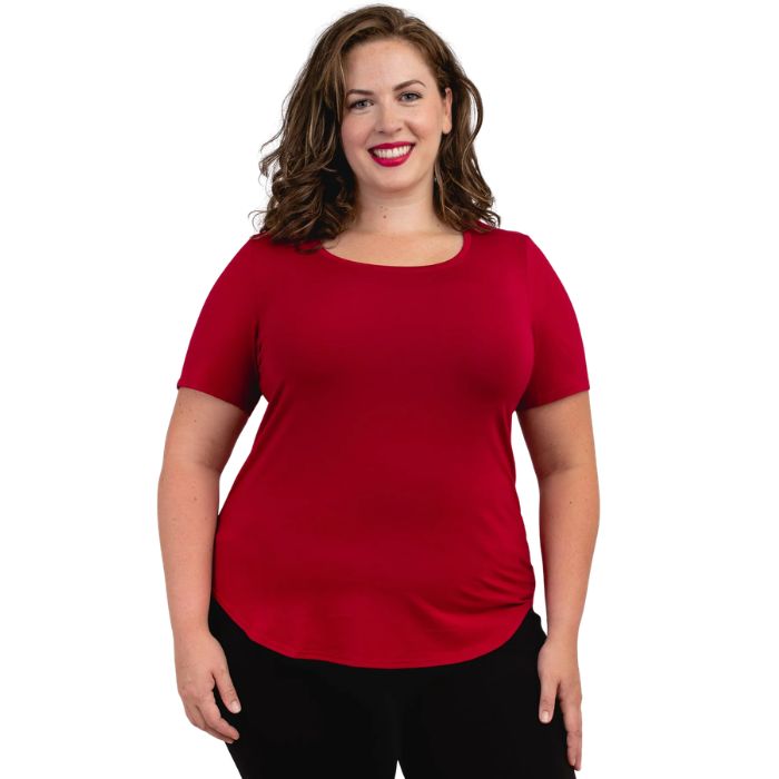 female model wearing lipstick red tessa tee front view on white background