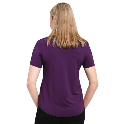 female model wearing royale purple tessa tee back view on white background