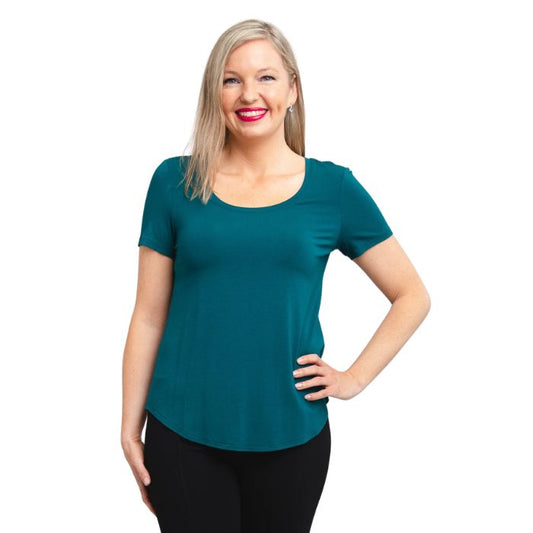 female model wearing teal green tessa tee front view on white background