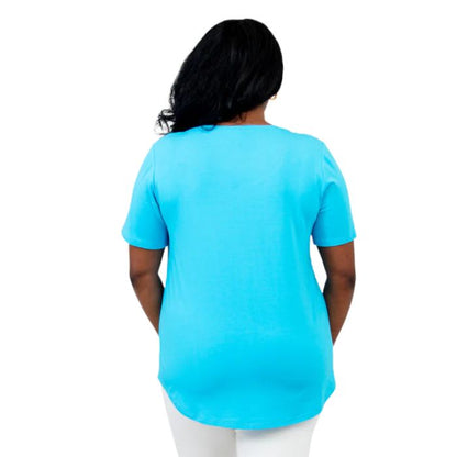 female model wearing turquoise blue tessa tee back view on white background