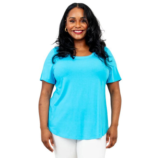 female model wearing turquoise blue tessa tee front view on white background