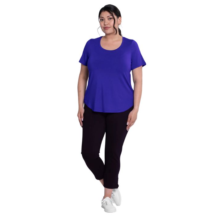 female model wearing violet purple tessa tee and black nadine cropped pants front view on white background