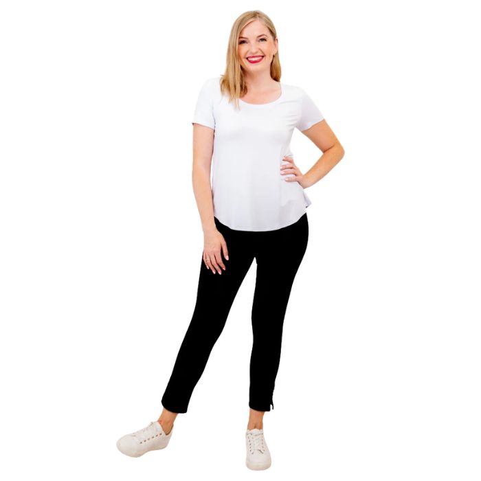 female model wearing white tessa tee and black nadine cropped pants front view on white background