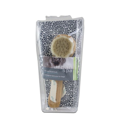 the bamboo and wool facial brush in package front view on white background