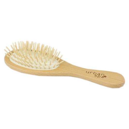 the massaging hair brush over view on white background