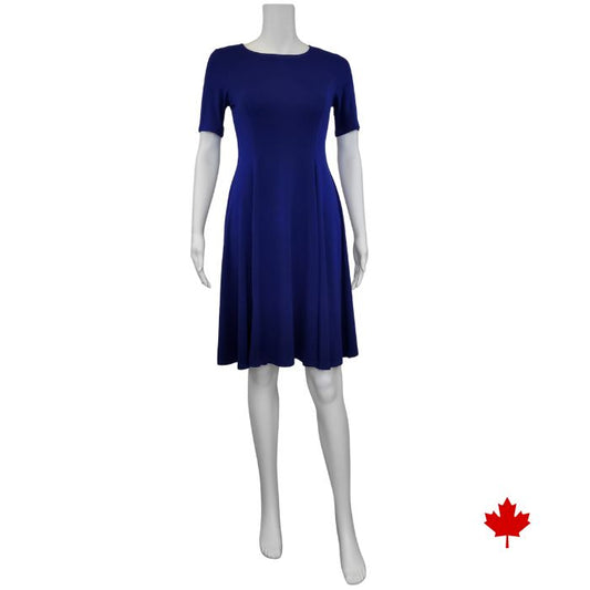mannequin wearing indigo blue twirl dress front view on white background