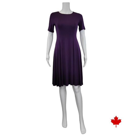 mannequin wearing plum purple twirl dress front view on white background