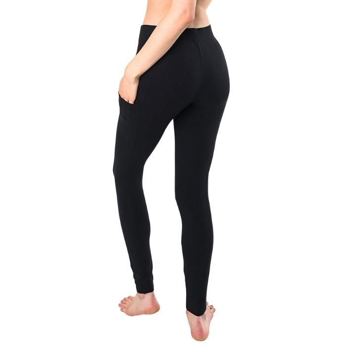 female model wearing black viva pocket leggings back view on white background