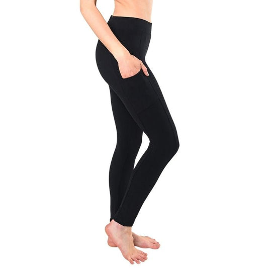 female model wearing black viva pocket leggings side view on white background