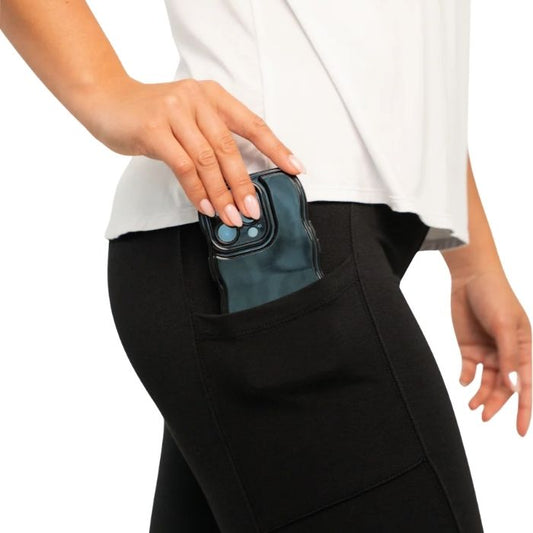 female model wearing black viva pocket leggings close-up side view on white background