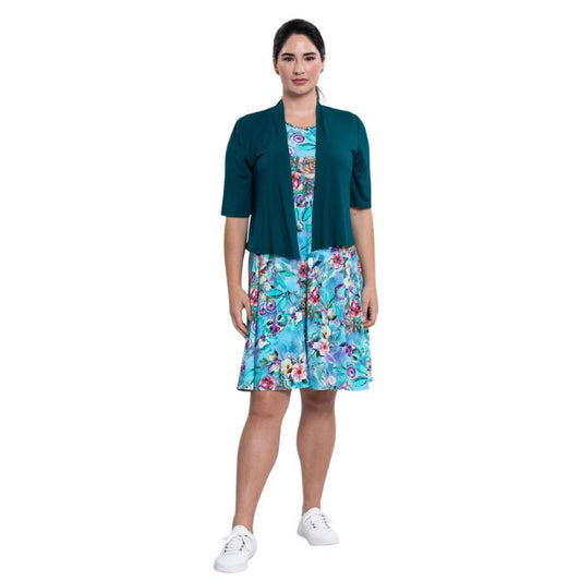 female model wearing teal nectar print willow dress and teal green doda jacket front veiw on white background