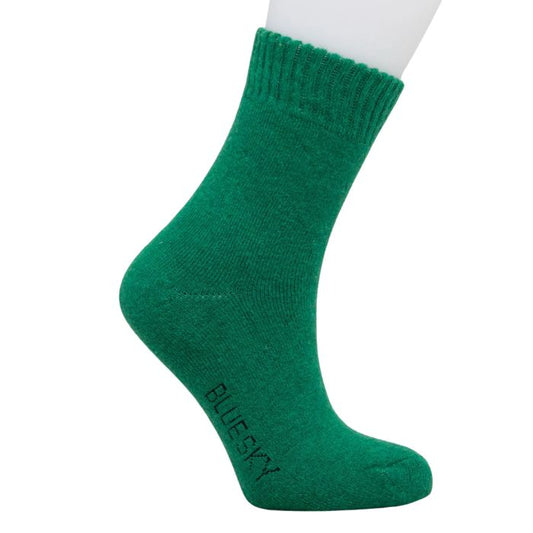 womens green merino wool sock set on a white background 