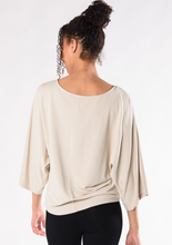 The Beckett Top is an elevated staple piece made to last through many seasons. Designed with a flattering boat-neck, relaxed bell sleeves, and a roomy silhouette. Great to wear anywhere, you will love this top. Fabrication: 95% Viscose from Bamboo 5% Spandex French Terry TERRERA Stone Brown $90.00