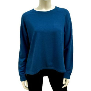 The chill is in the air and that means it's sweatshirt time! The Brenda Cropped Sweatshirt is the updated version of the "crop" sweatshirt; by taking the band off the hem for more movement and a looser shape!  Proudly Made in Canada  Fabrication: 66% Bamboo, 28% Cotton, 6% Spandex  $85.00 Marine Blue