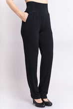 The Clair tall pant has a trouser fit great for all shapes and offer features we love. The wide self-fabric waistband can be worn high, medium, or low, for an easy fit. Tiny gathers below the waistband create a forgiving fullness around the hips, allowing the fabric to fall gently without pulling, and the classic tapered leg is a perfect style building block. Fabrication: 95% Bamboo, 5% Lycra  BLUE SKY  Blue Sky fit guide - generous; go down a size $80.00 Black