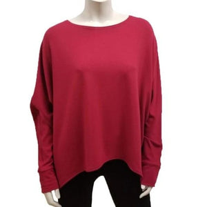  A throw on your body and go piece; the French Terry Sweatshirt has a high/ low hemline, loose Dolman sleeves. Made of Bamboo it is cool in the summer and warm in the winter making it an excellent choice that can be worn all year round.  (One Size)  Proudly Made in Canada  Fabrication: 66% Bamboo, 28% Cotton, 6% Spandex   GILMOUR  $97.00 raspberry red