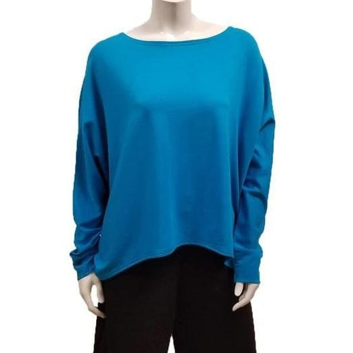  A throw on your body and go piece; the French Terry Sweatshirt has a high/ low hemline, loose Dolman sleeves. Made of Bamboo it is cool in the summer and warm in the winter making it an excellent choice that can be worn all year round.  (One Size)  Proudly Made in Canada  Fabrication: 66% Bamboo, 28% Cotton, 6% Spandex   GILMOUR  $97.00 turquoise blue